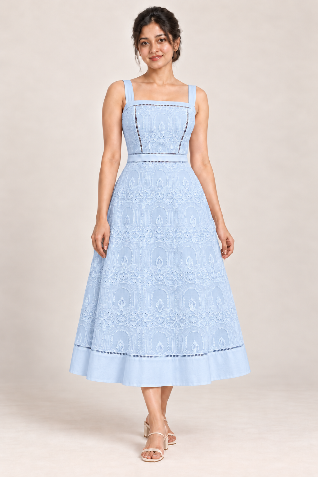 AI design preview of the Élodie cutwork dress in Light Blue, front view on a model